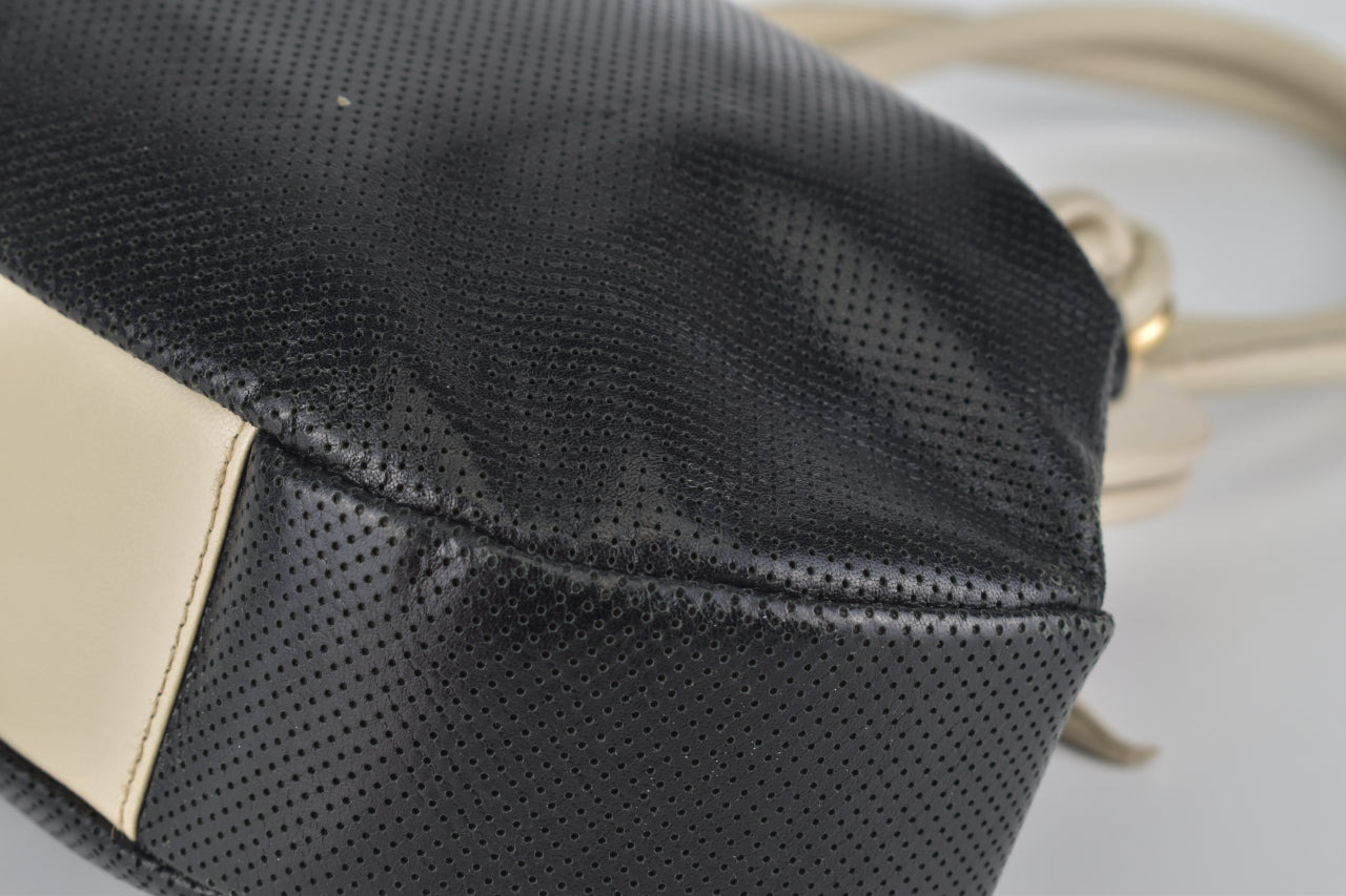 Perforated Bow Frame Bag