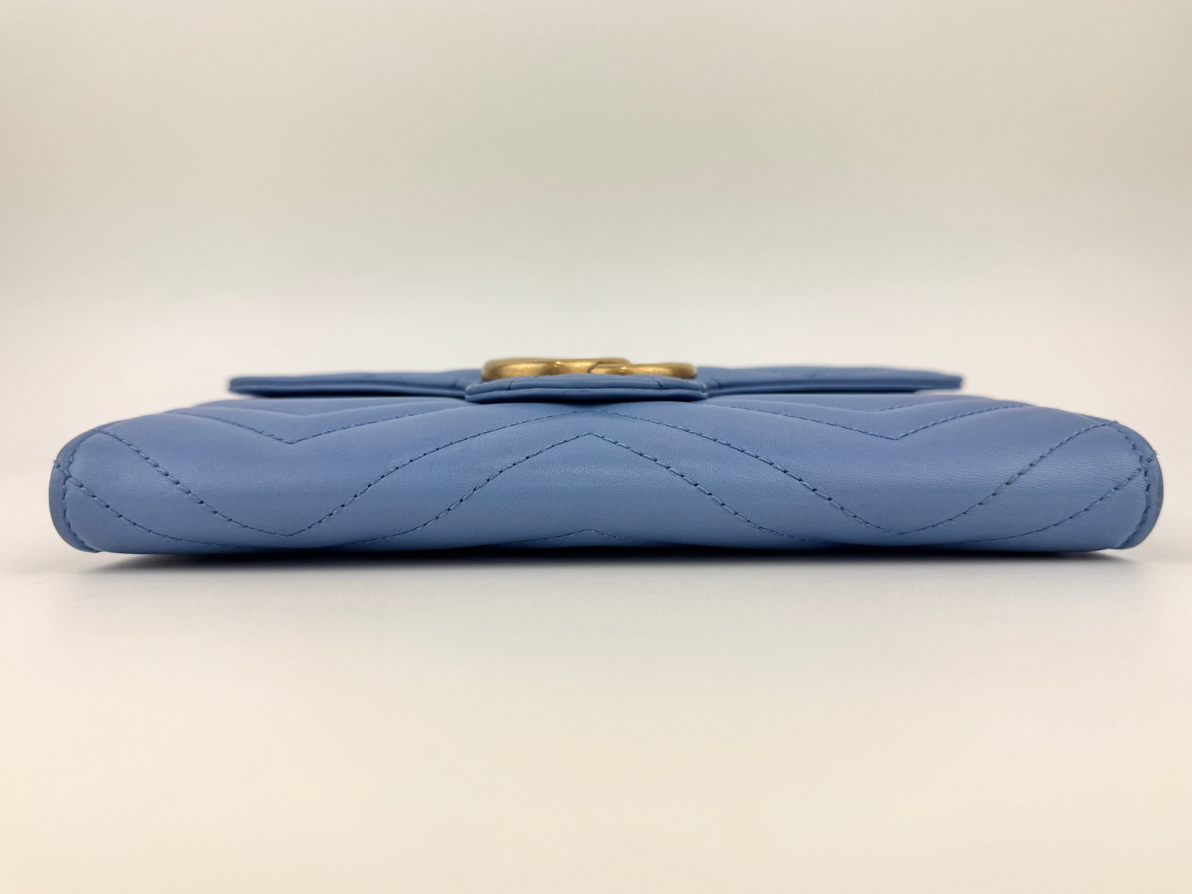 GG Marmont Matelasse Leather Chain Wallet in Light Blue - Glampot