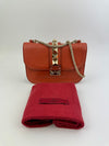 Small Glam Lock Orange Leather Flap Bag