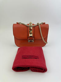 Small Glam Lock Orange Leather Flap Bag
