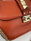 Small Glam Lock Orange Leather Flap Bag