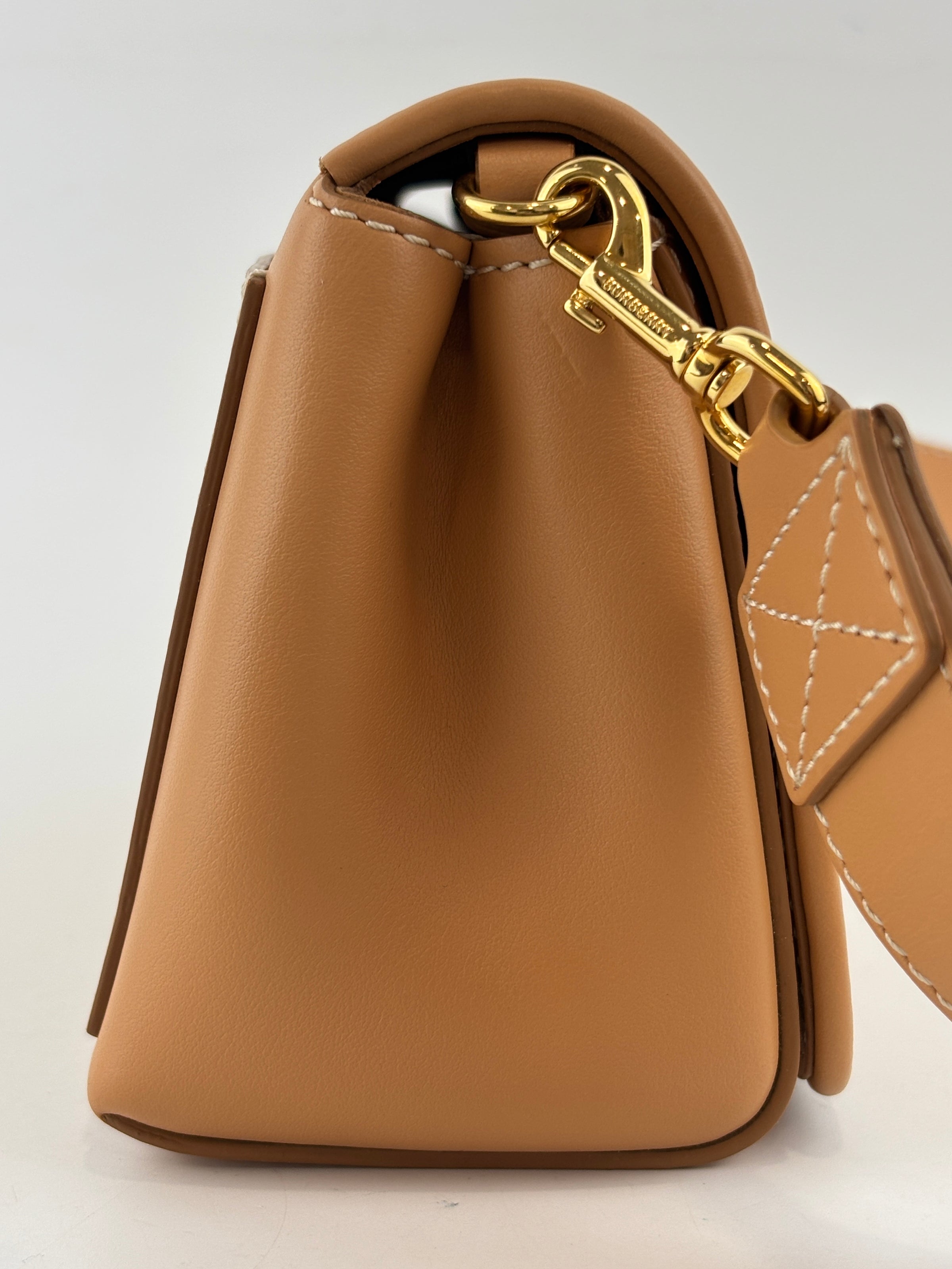 Hackberry Horseferry Debossed Leather Crossbody Bag in Warm Sand