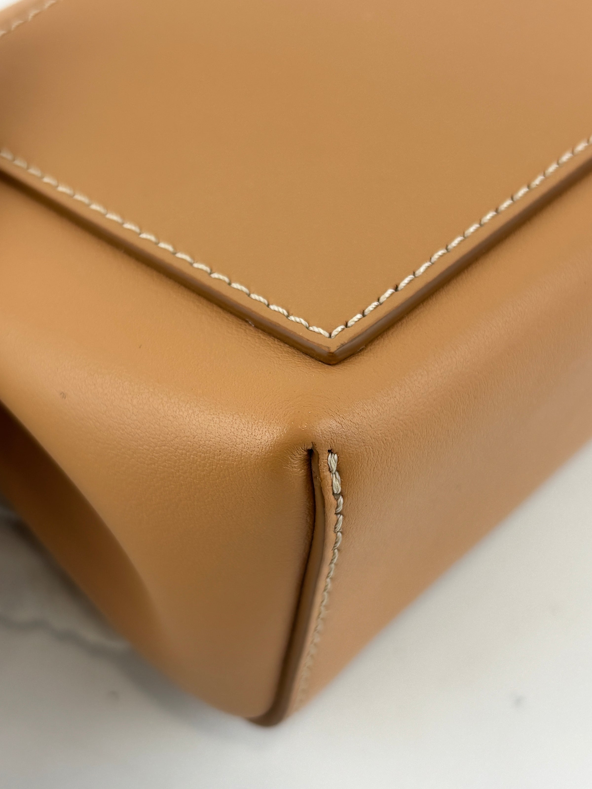 Hackberry Horseferry Debossed Leather Crossbody Bag in Warm Sand