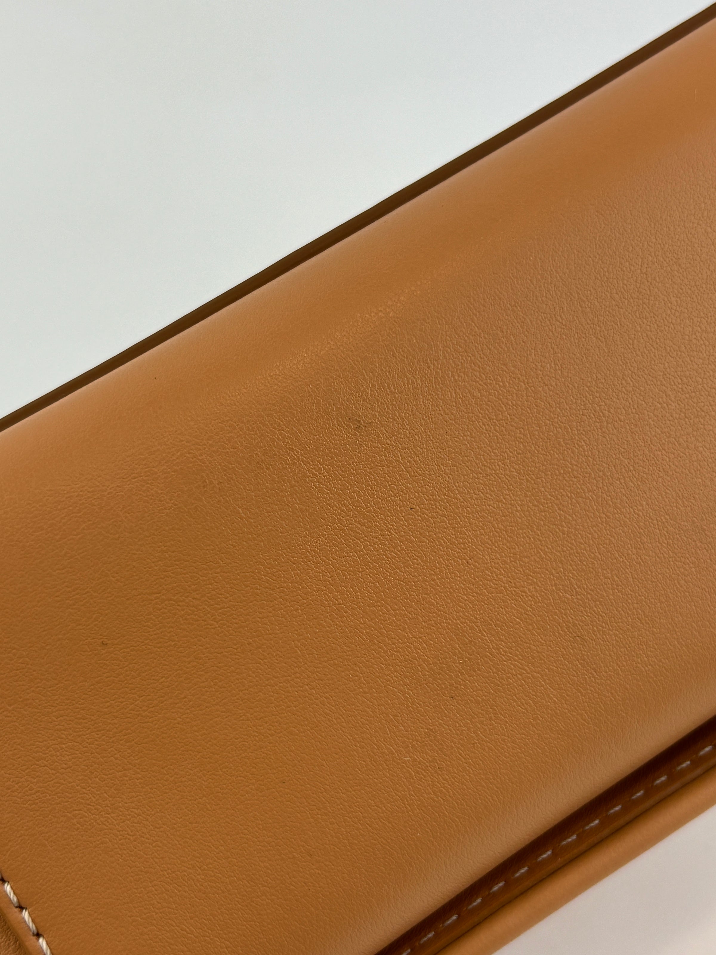 Hackberry Horseferry Debossed Leather Crossbody Bag in Warm Sand
