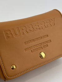 Hackberry Horseferry Debossed Leather Crossbody Bag in Warm Sand
