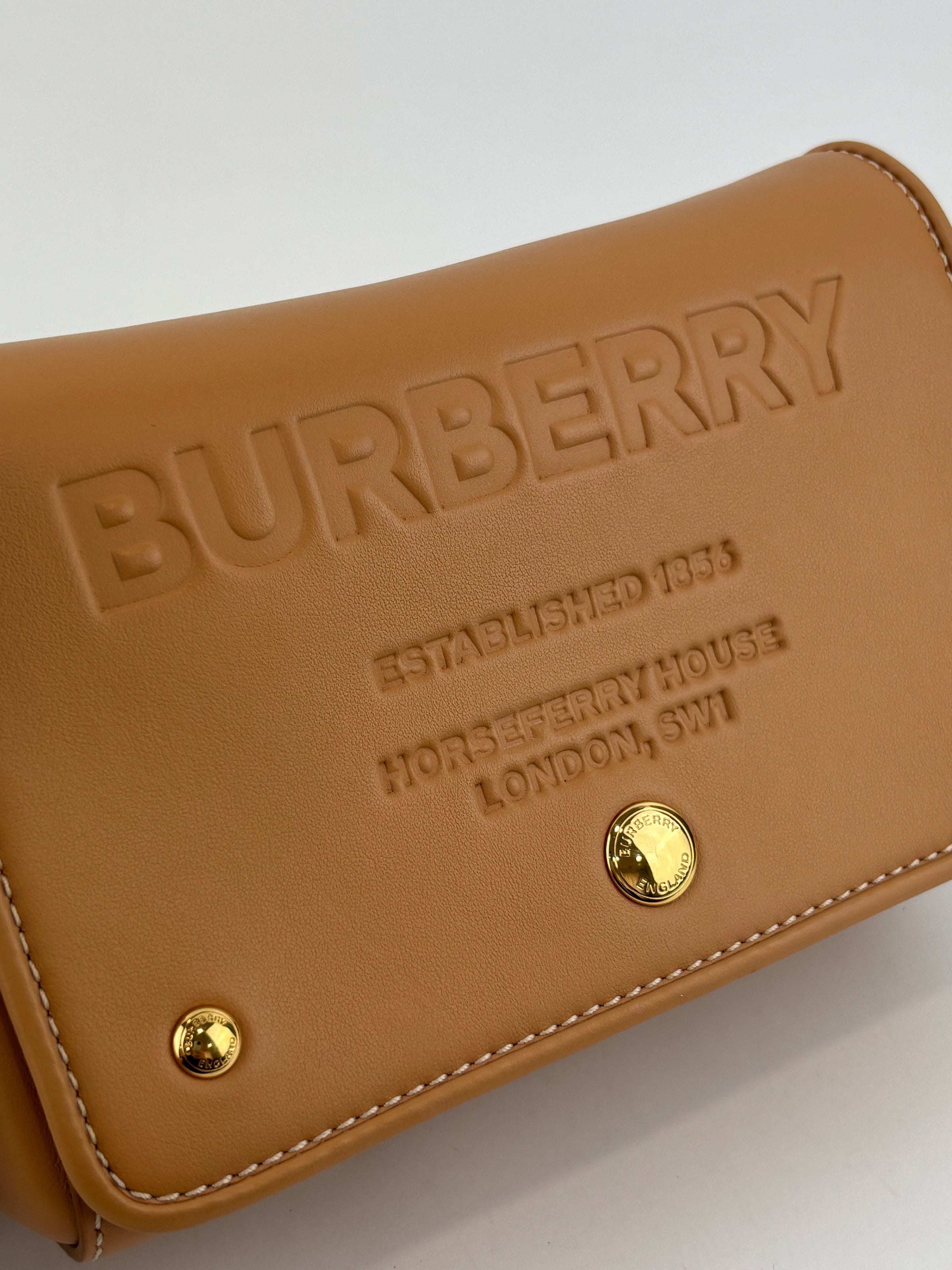 Hackberry Horseferry Debossed Leather Crossbody Bag in Warm Sand