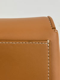 Hackberry Horseferry Debossed Leather Crossbody Bag in Warm Sand