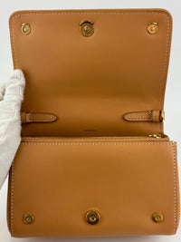 Hackberry Horseferry Debossed Leather Crossbody Bag in Warm Sand