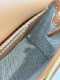 Hackberry Horseferry Debossed Leather Crossbody Bag in Warm Sand