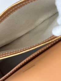 Hackberry Horseferry Debossed Leather Crossbody Bag in Warm Sand