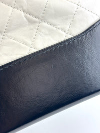 Medium Gabrielle Aged Calfskin Quilted Hobo Black / White - Glampot