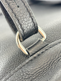 Black Calfskin Lockme Backpack