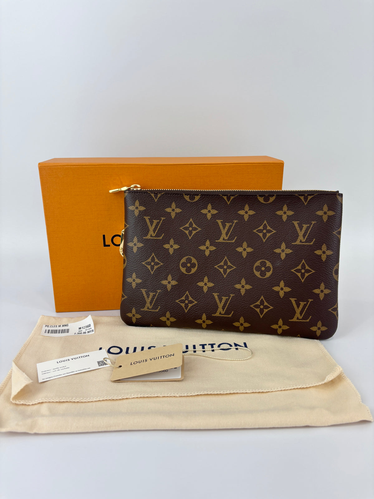 M13560 Monogram Canvas Pouch