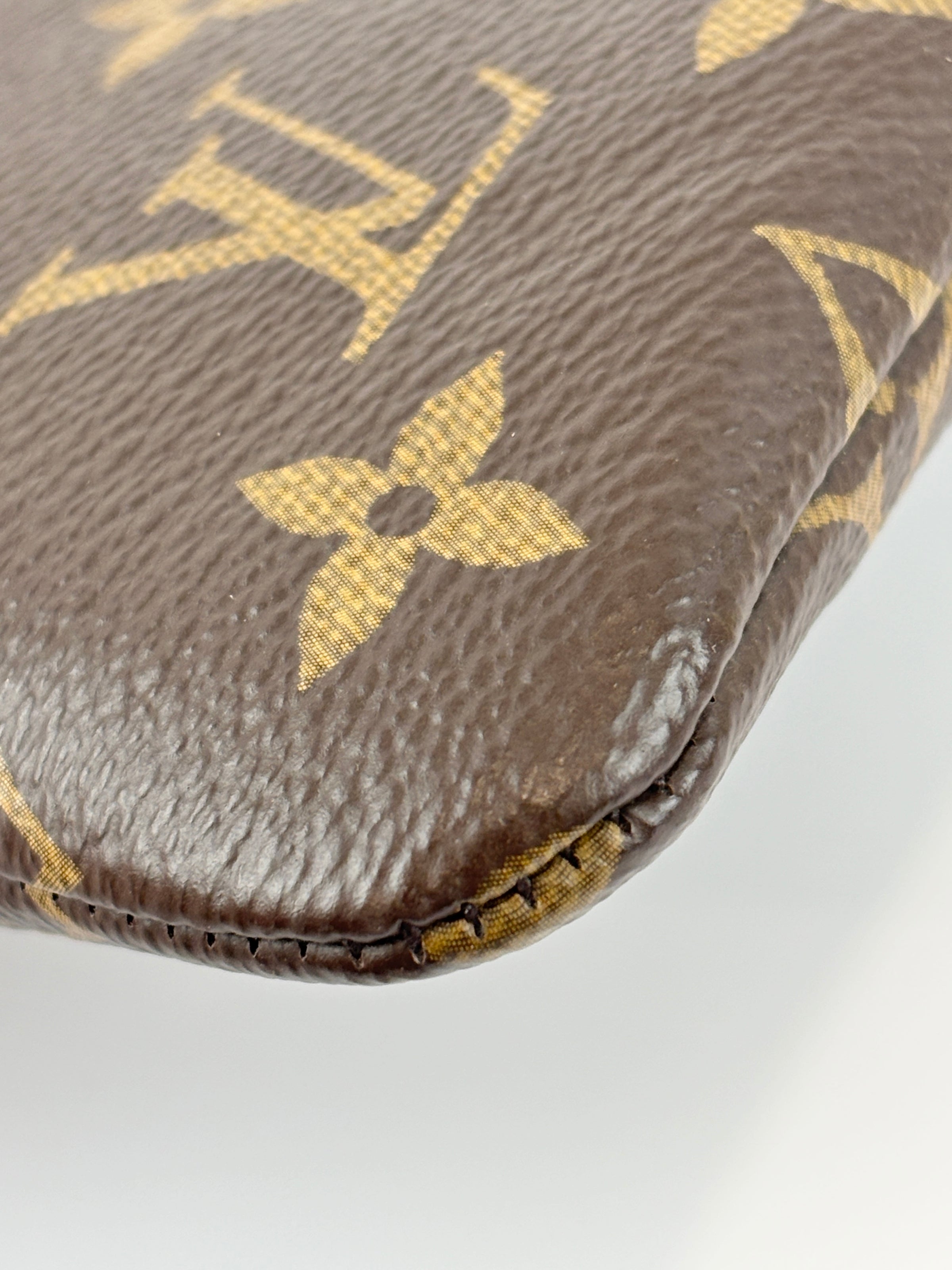 M13560 Monogram Canvas Pouch