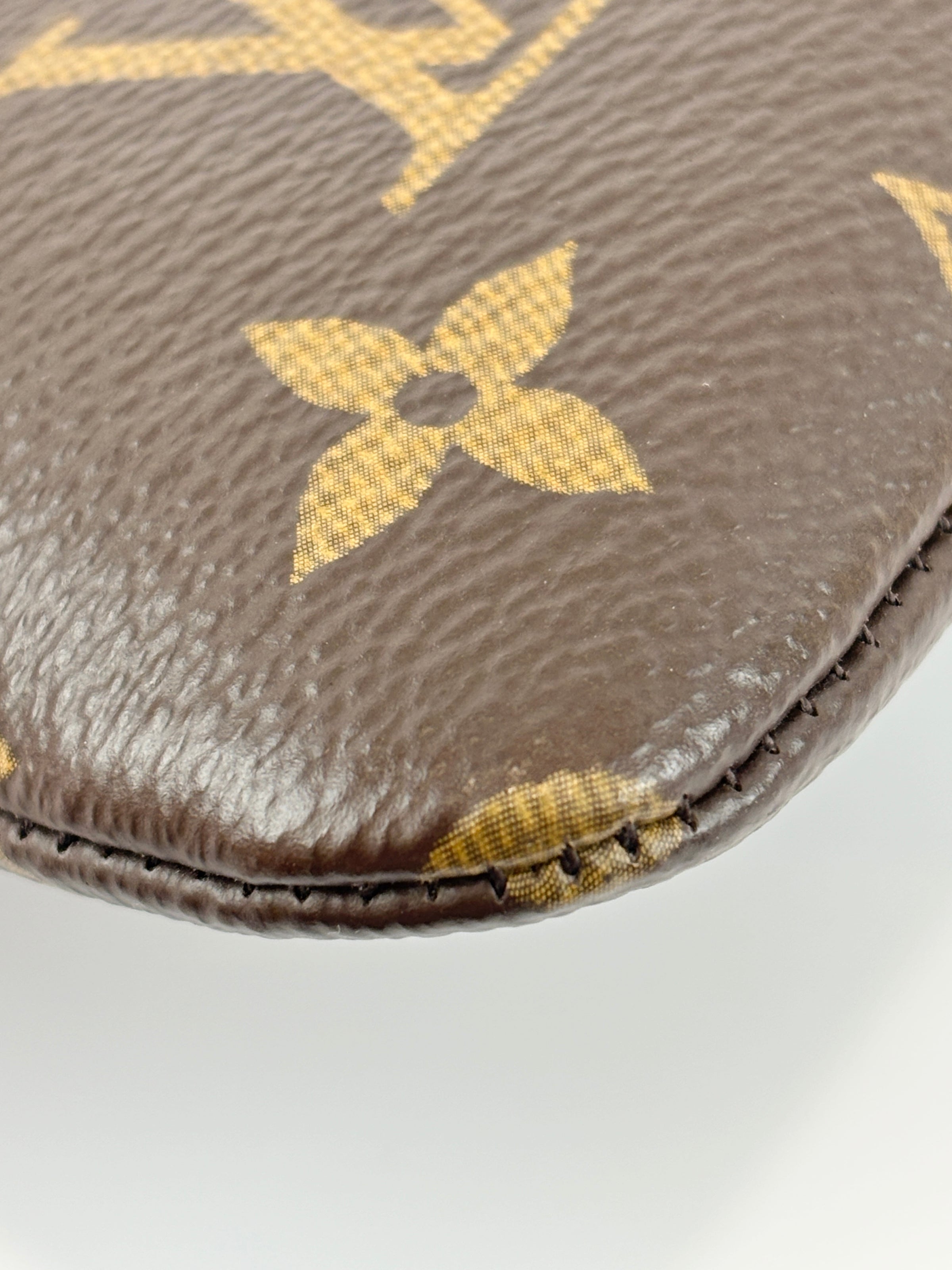 M13560 Monogram Canvas Pouch