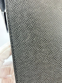 Pochette Voyage Clutch in Taiga Leather