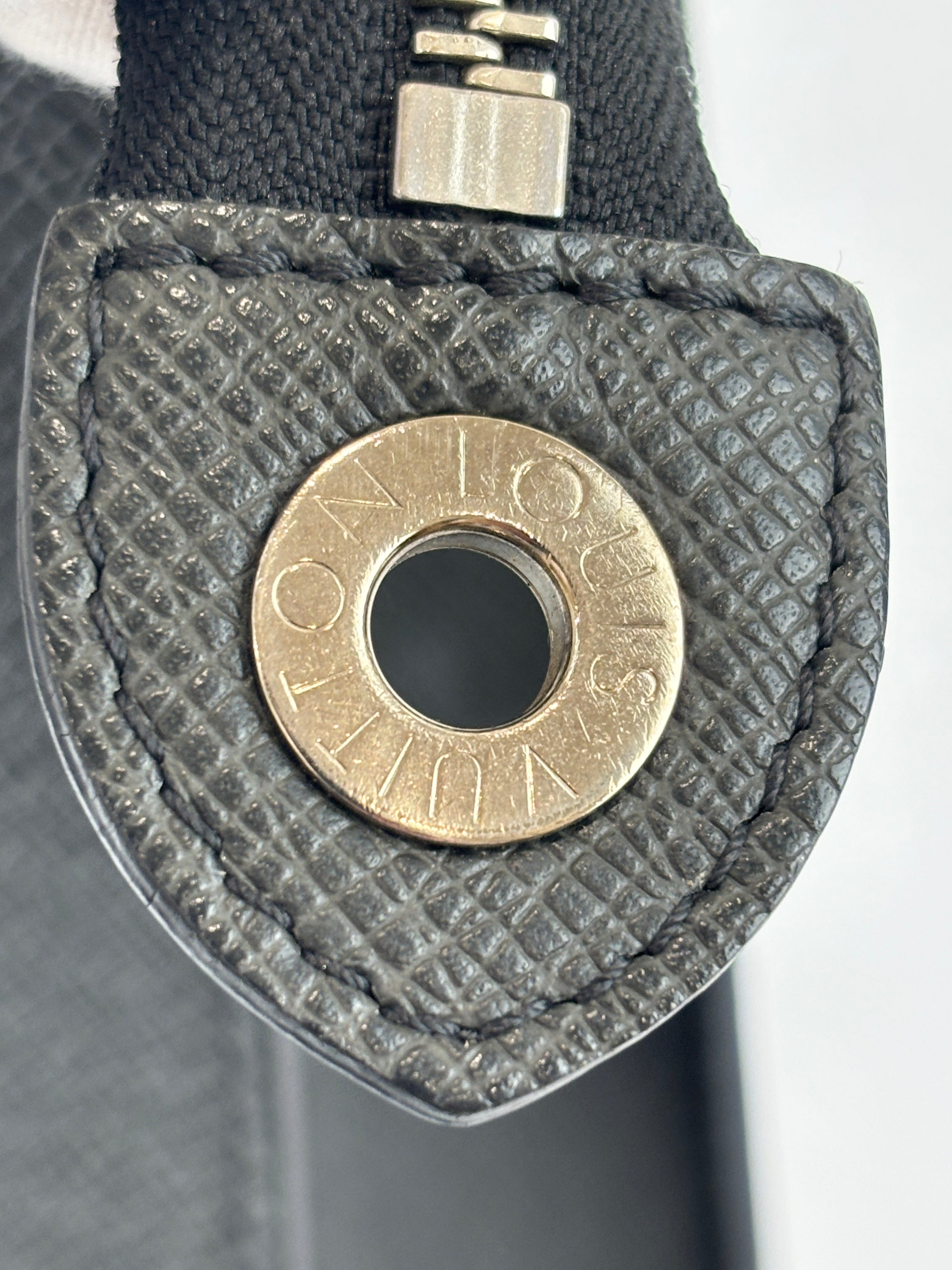 Pochette Voyage Clutch in Taiga Leather