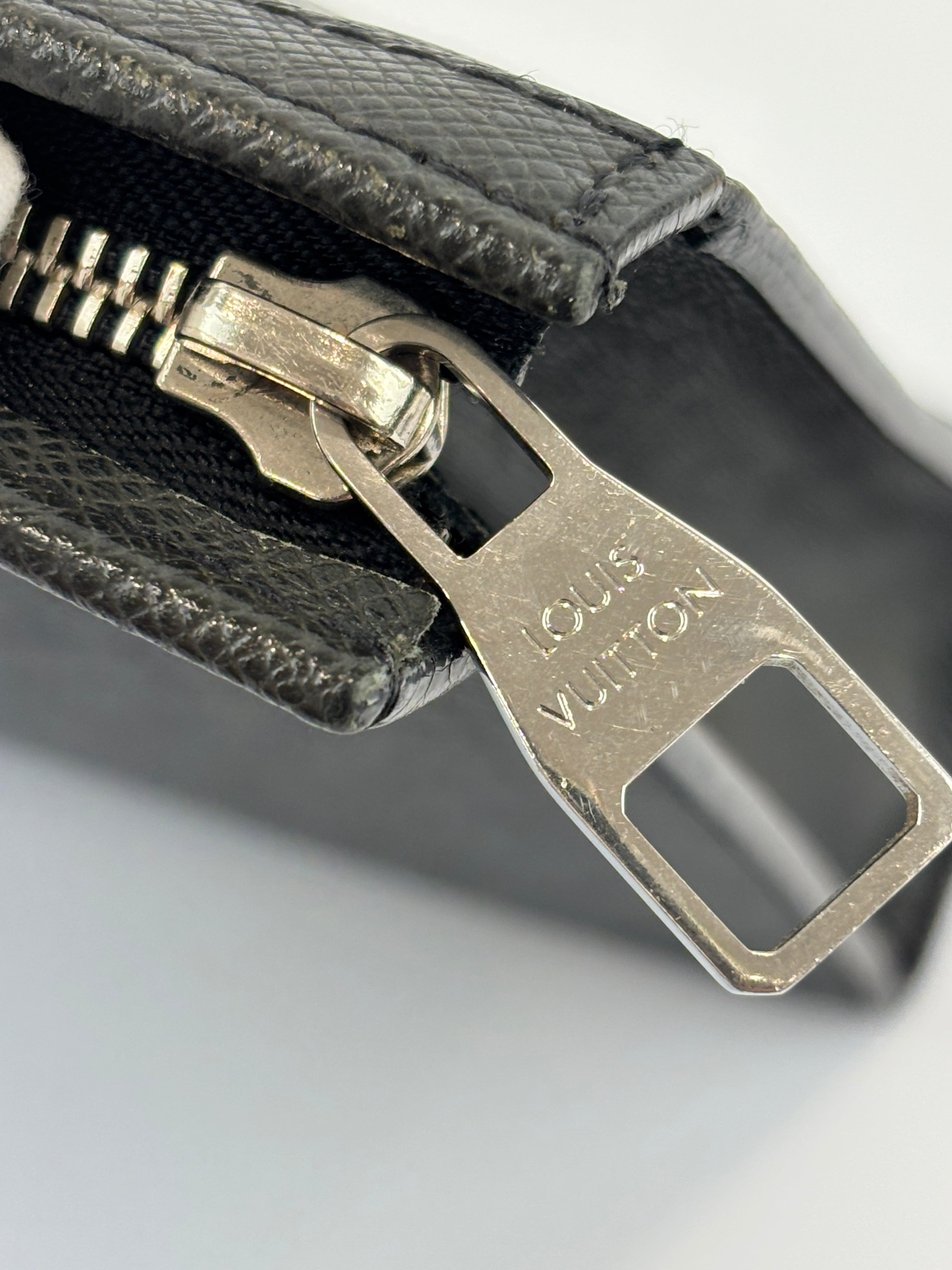 Pochette Voyage Clutch in Taiga Leather