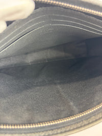 Pochette Voyage Clutch in Taiga Leather
