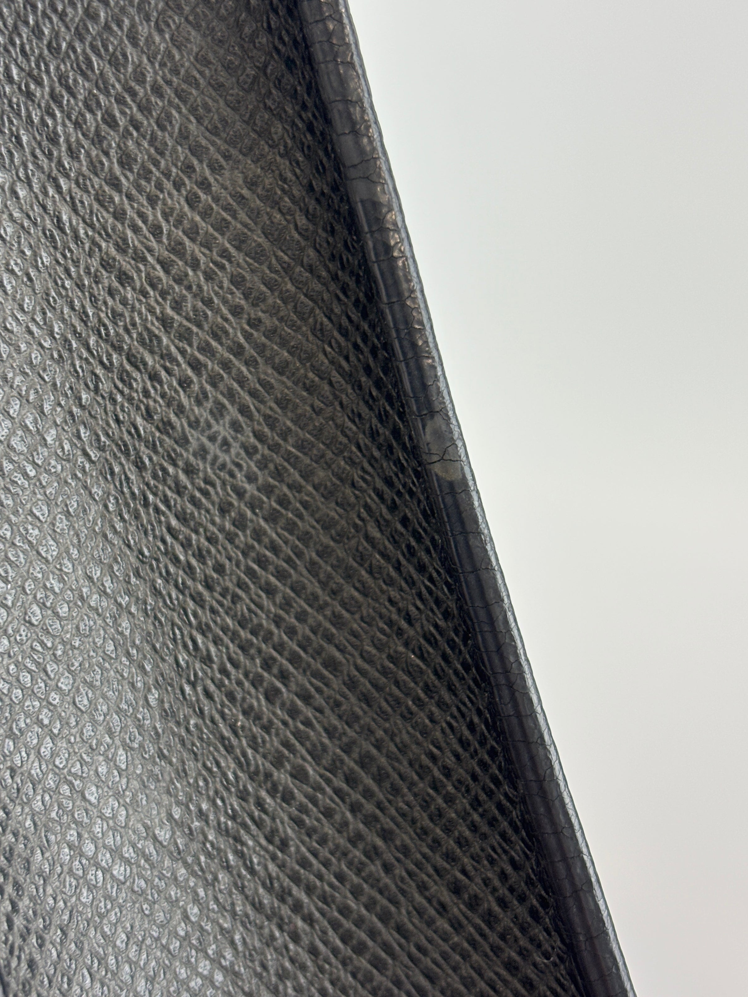 Pochette Voyage Clutch in Taiga Leather