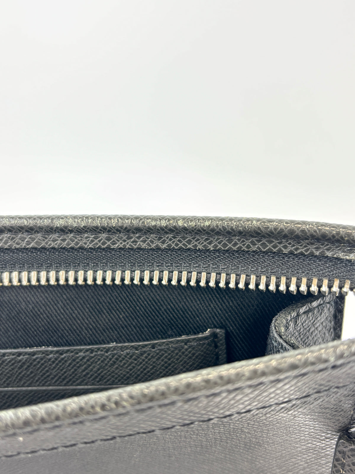 Pochette Voyage Clutch in Taiga Leather