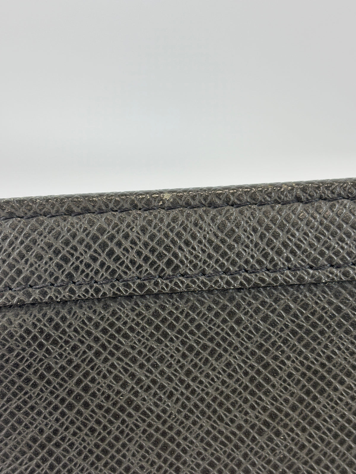 Pochette Voyage Clutch in Taiga Leather