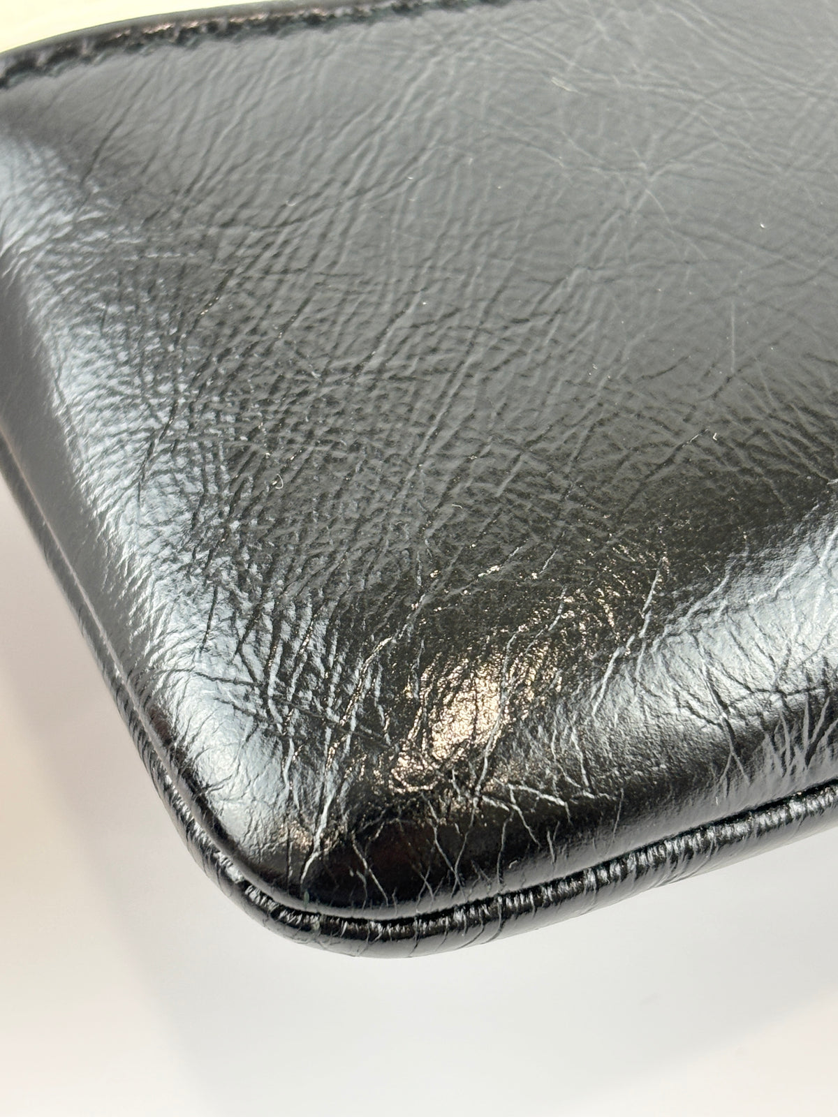 Gabrielle Large O Case Clutch in Black / Off White Aged Calfskin