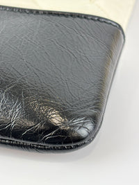 Gabrielle Large O Case Clutch in Black / Off White Aged Calfskin