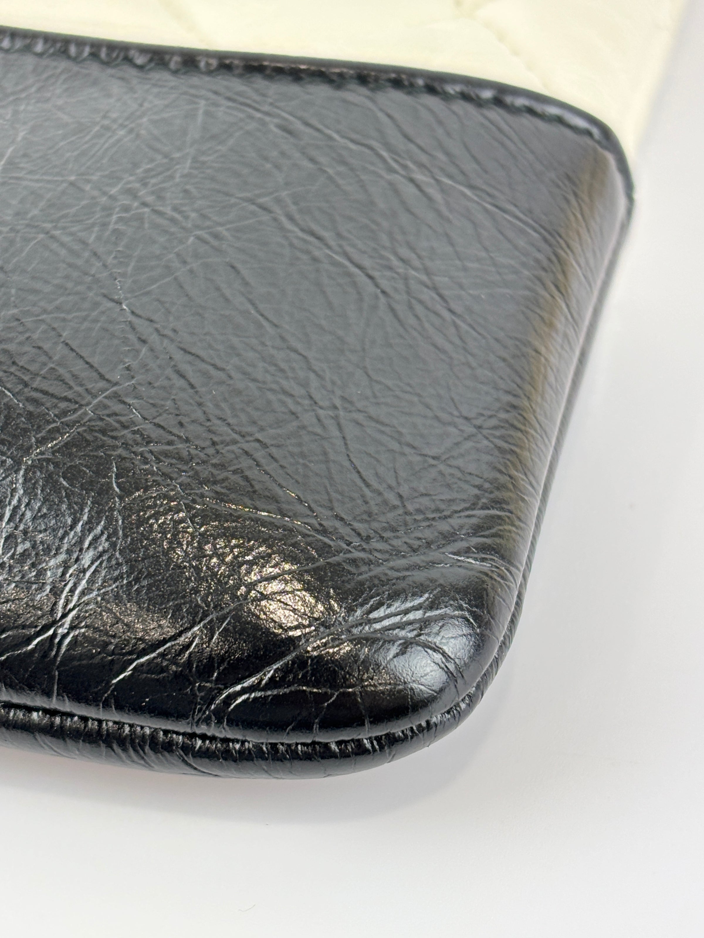 Gabrielle Large O Case Clutch in Black / Off White Aged Calfskin