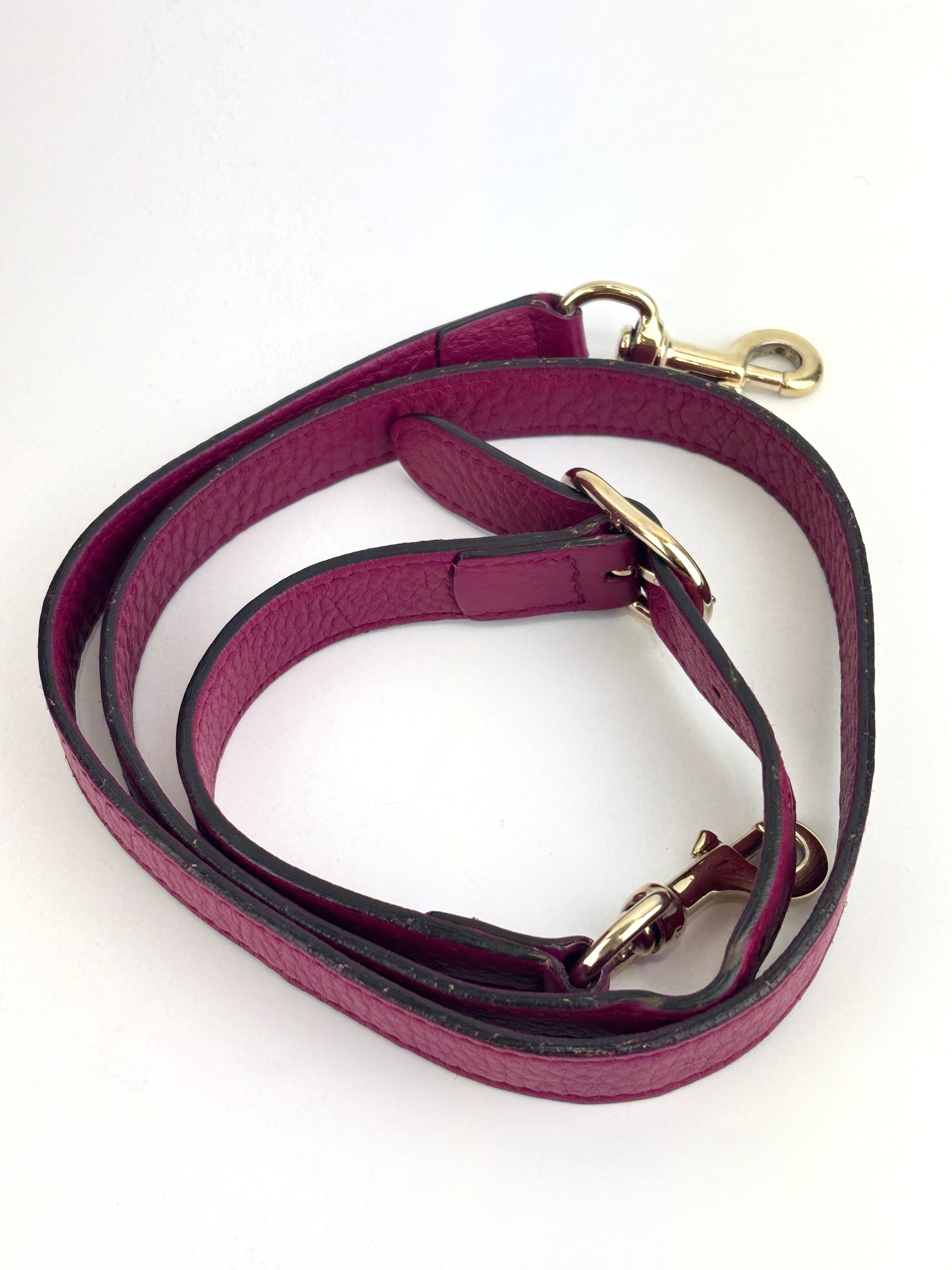 323660 紫红色皮革中号竹节手提包