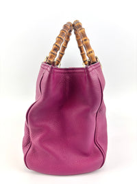 323660 紫红色皮革中号竹节手提包