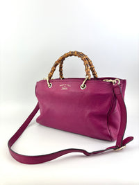 323660 紫红色皮革中号竹节手提包
