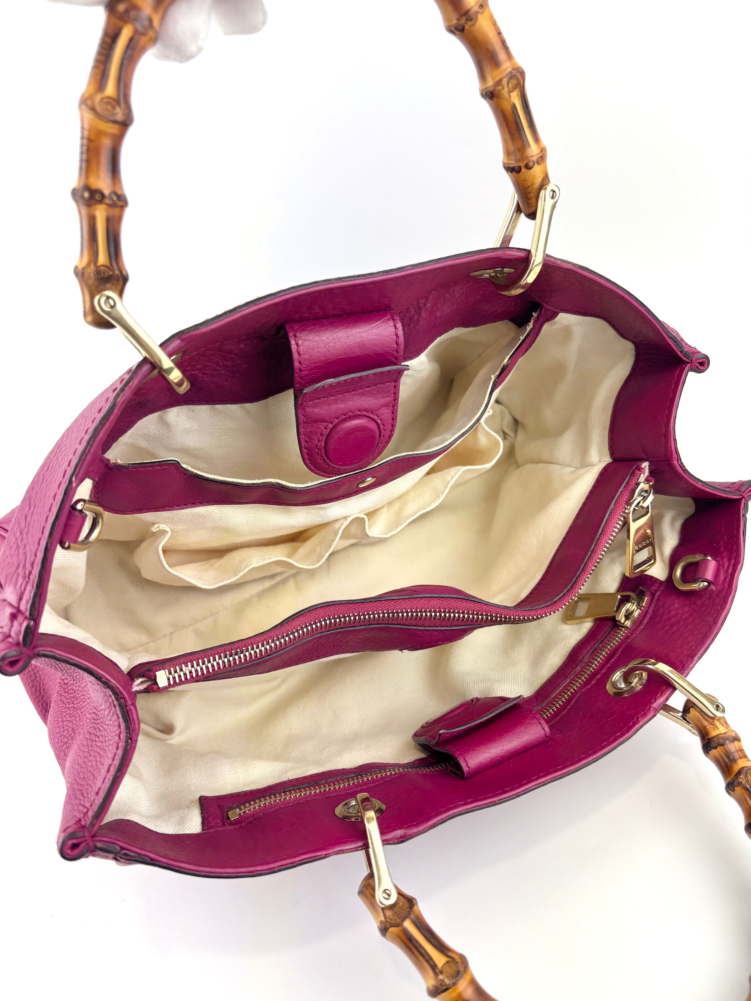 323660 紫红色皮革中号竹节手提包