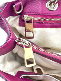 323660 紫红色皮革中号竹节手提包