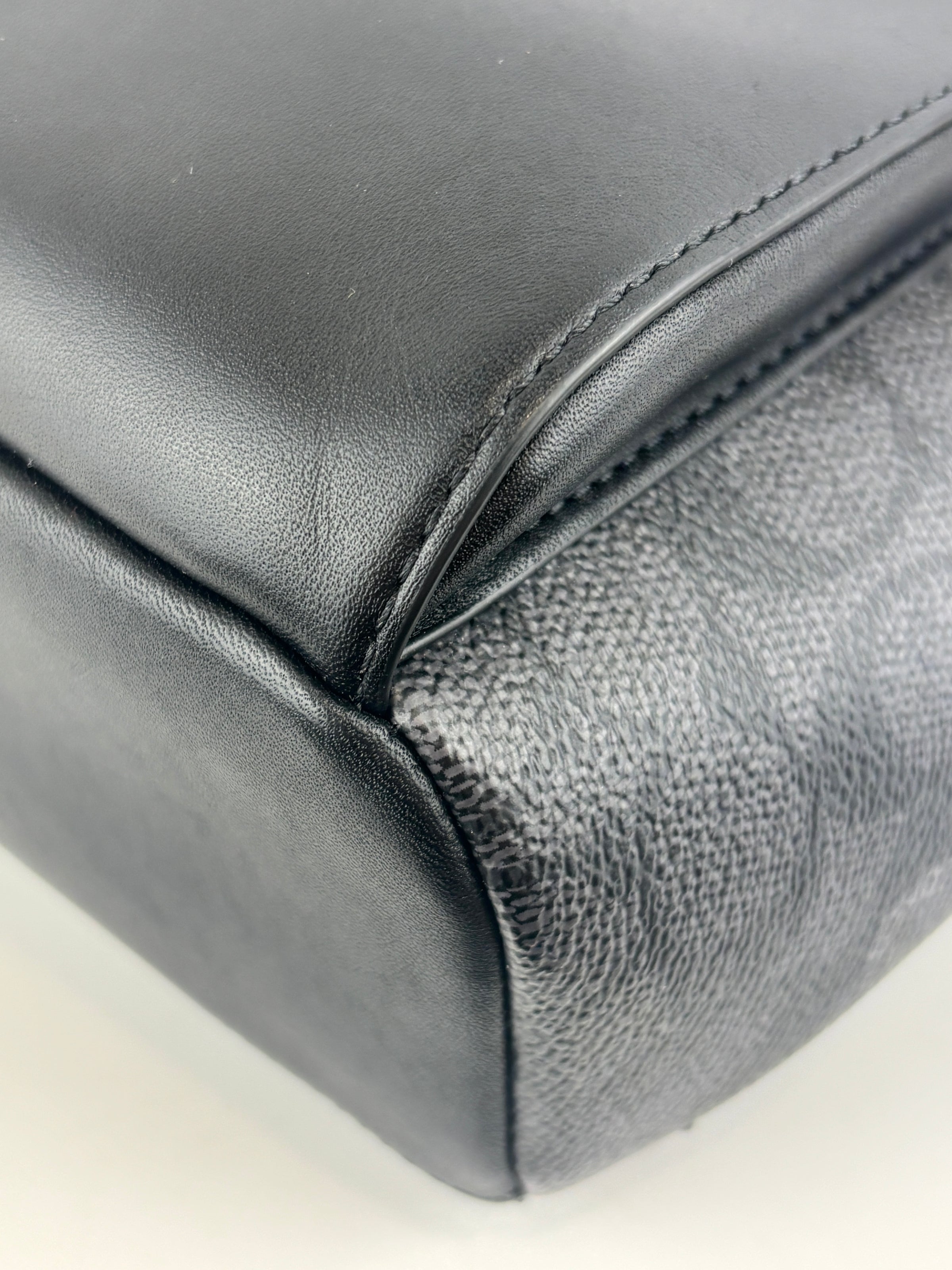 Turnlock Sling Pack Black in Signature Canvas