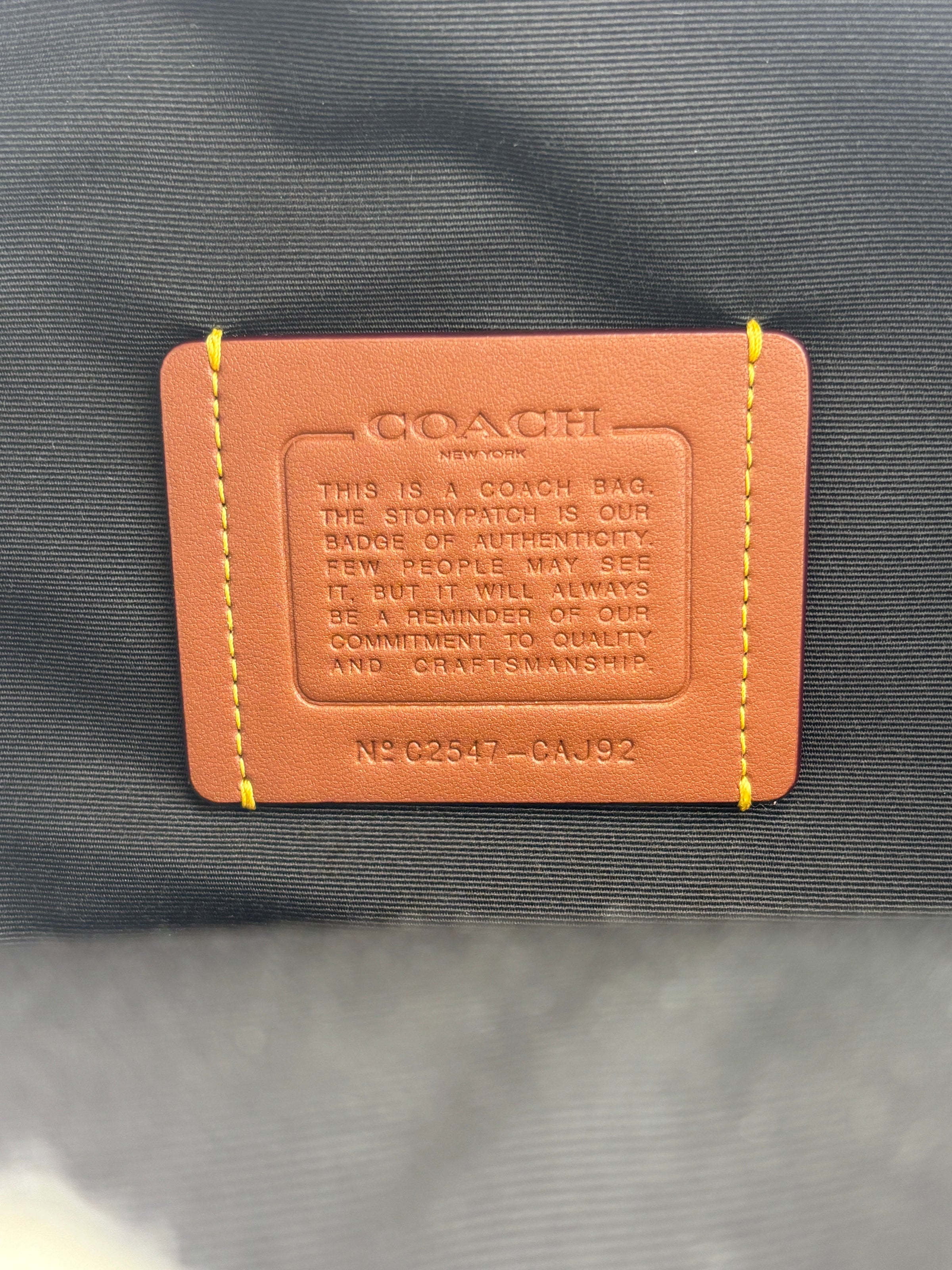 Turnlock Sling Pack Black in Signature Canvas