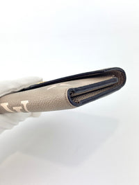双色Monogram Empreinte Victorine钱夹