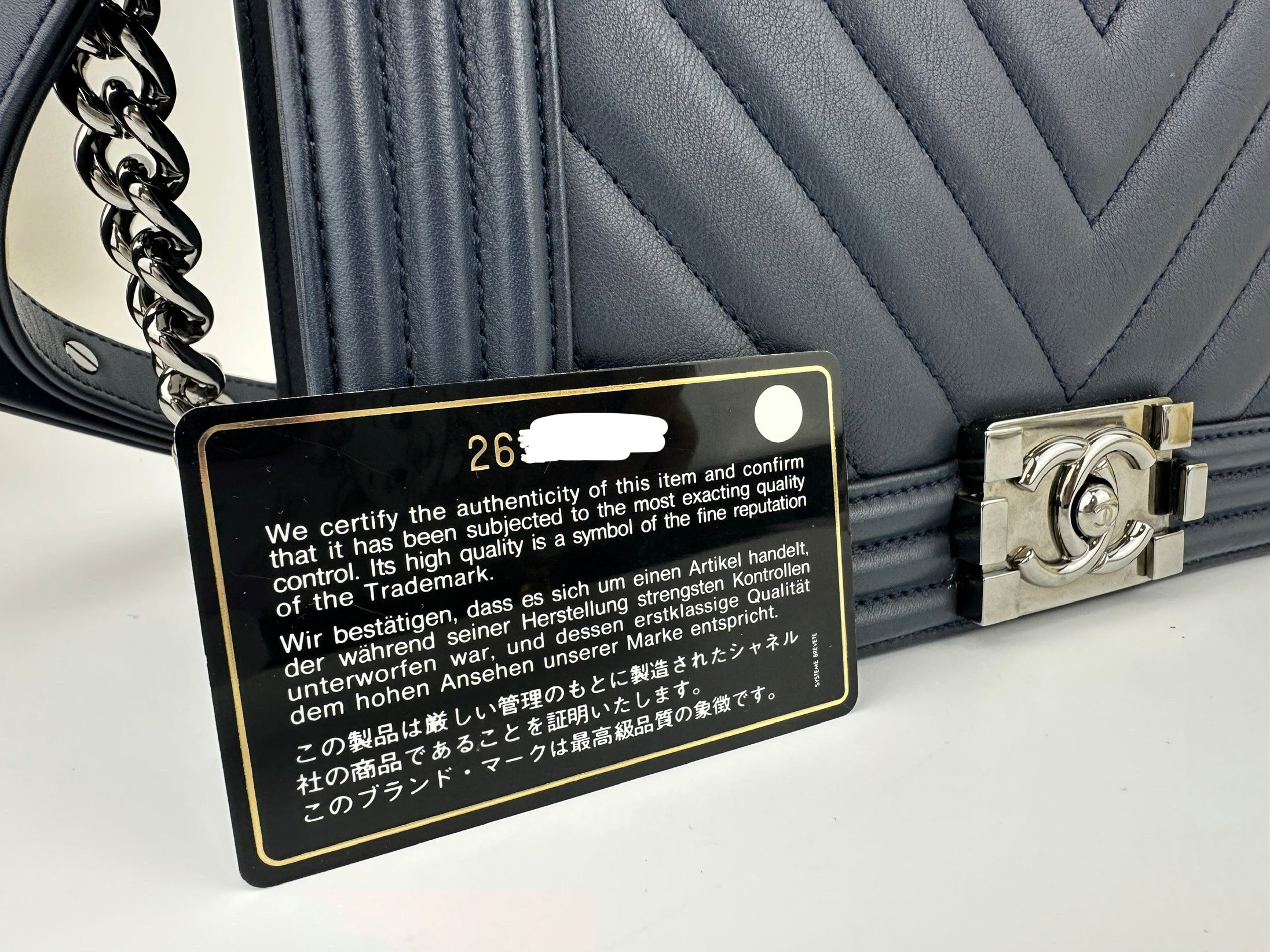 Old Medium Boy Chevron Lambskin Navy PHW