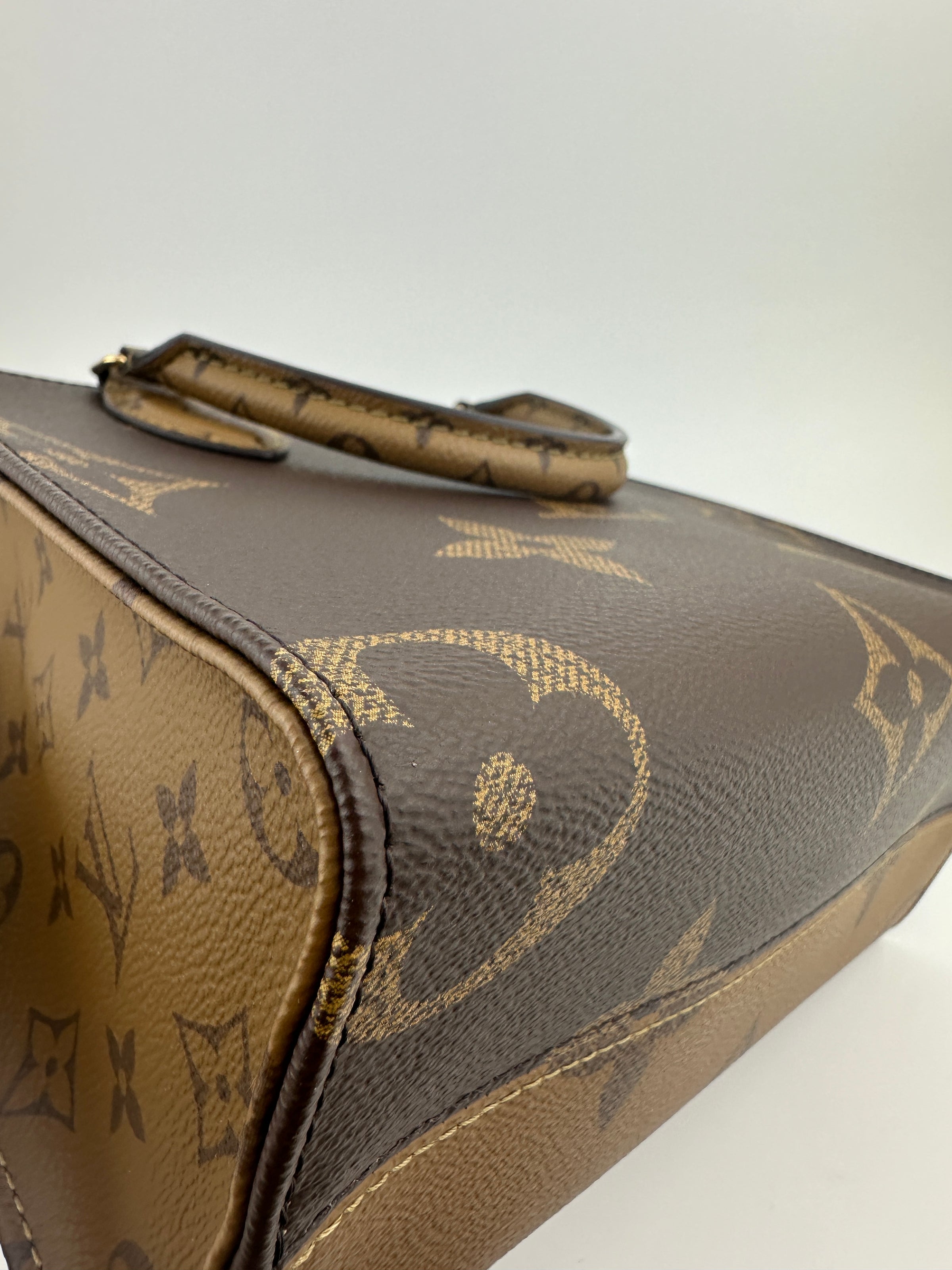 M46373 OnTheGo PM Monogram Reverse Tote Bag (RFID)