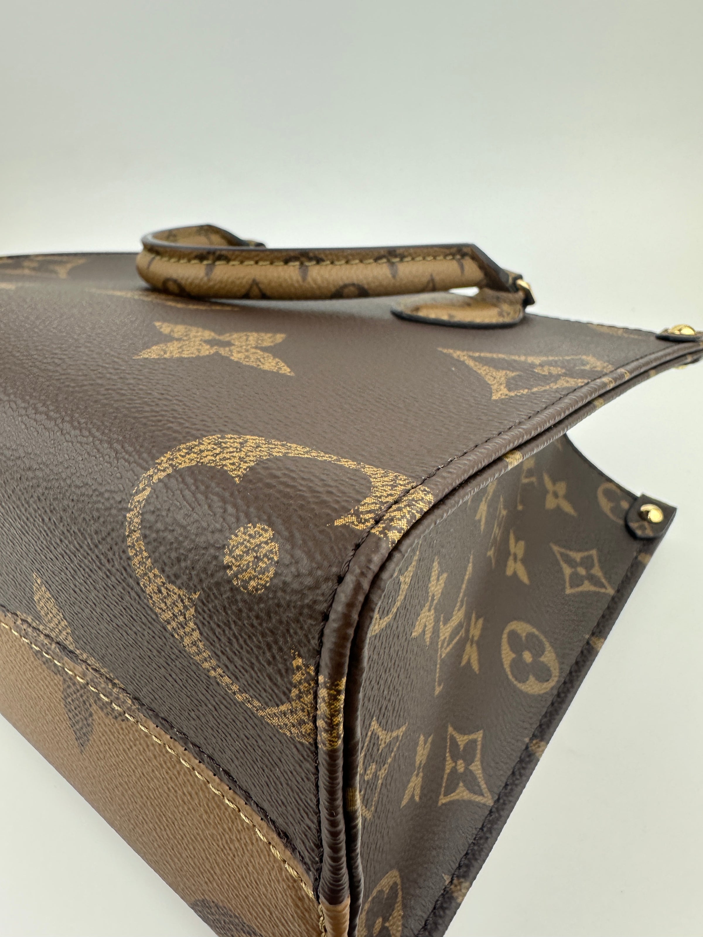 M46373 OnTheGo PM Monogram Reverse Tote Bag (RFID)