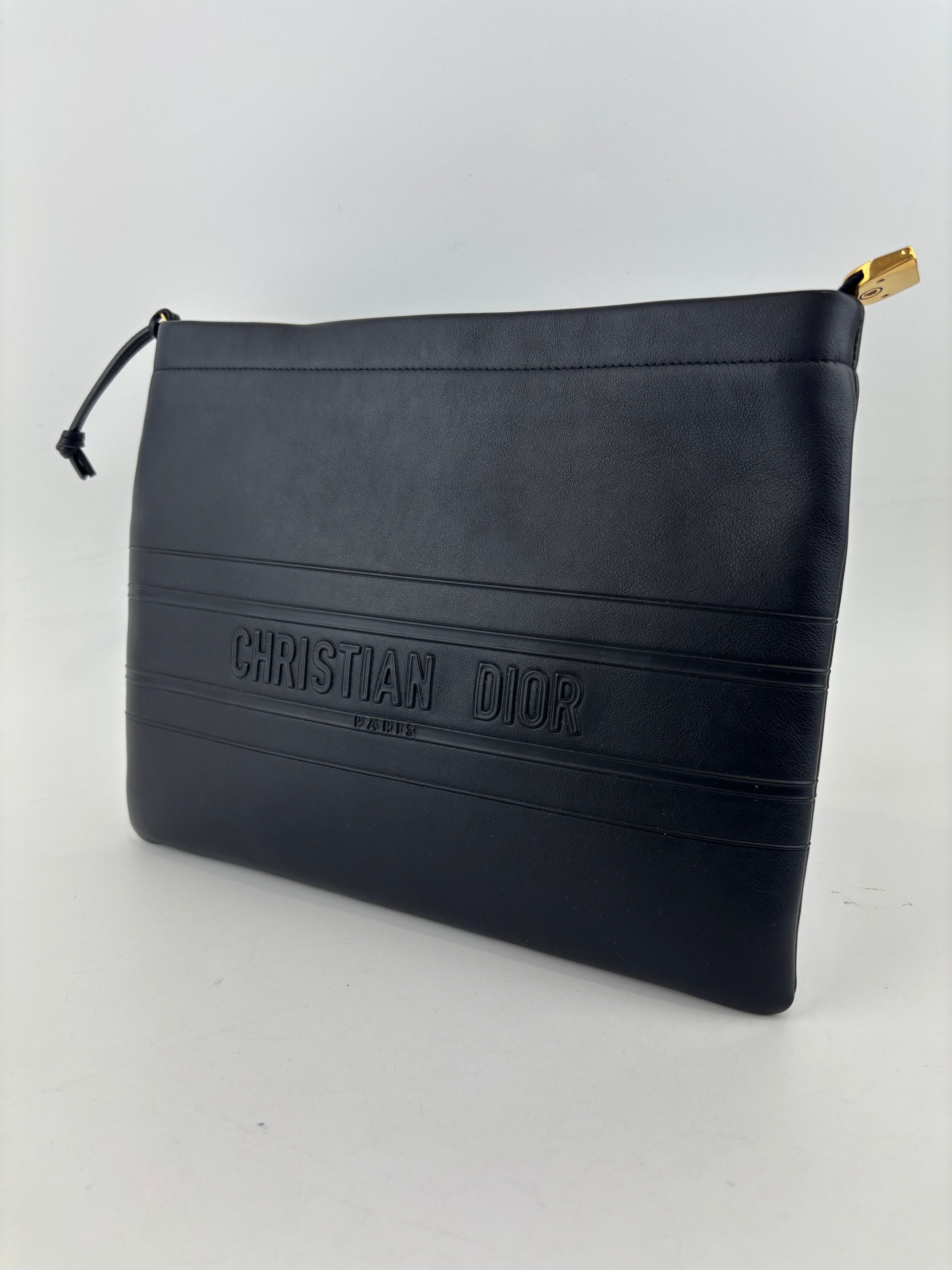 Smooth Calfskin Stripe Zip Clutch in Black