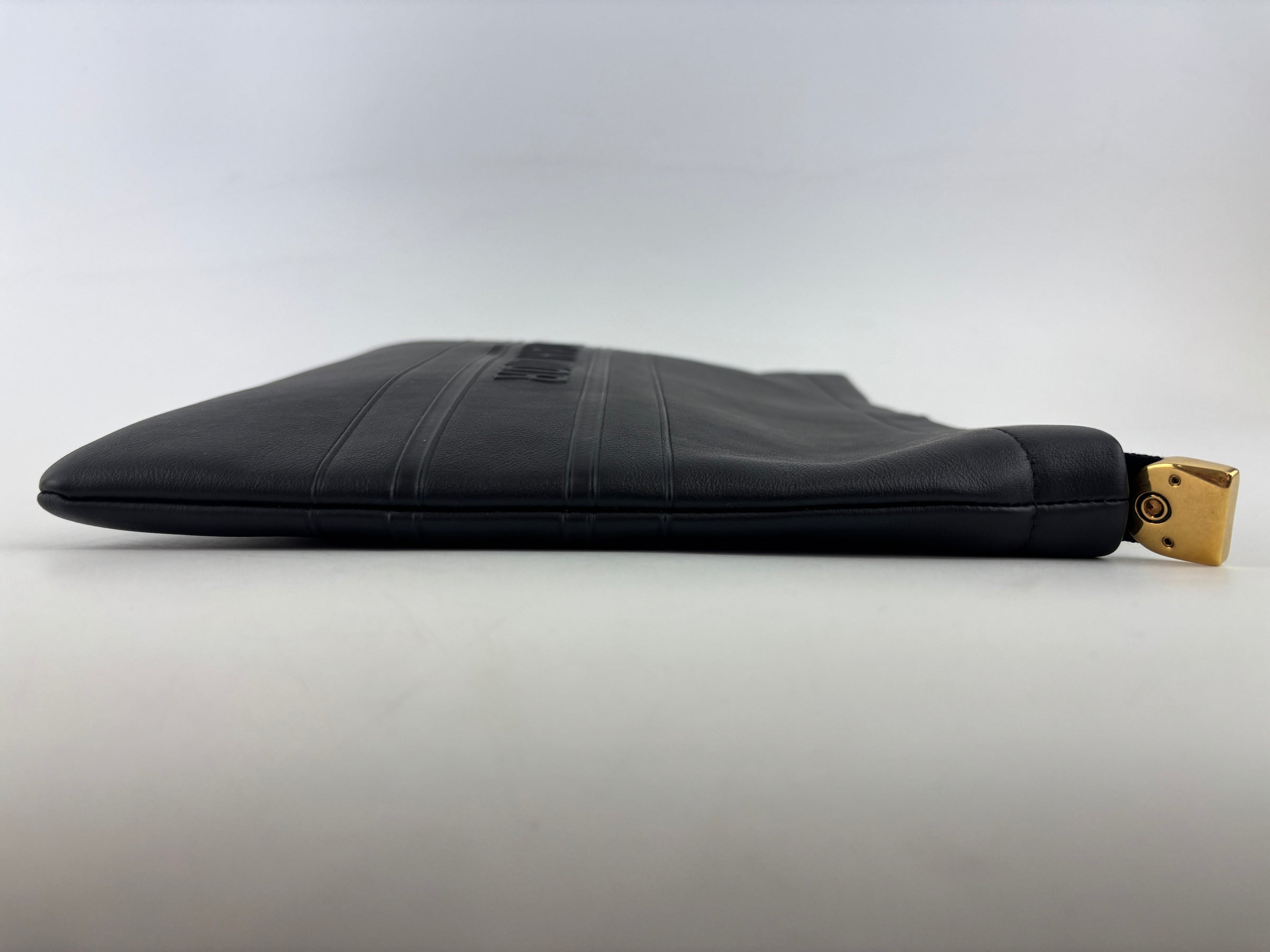 Smooth Calfskin Stripe Zip Clutch in Black