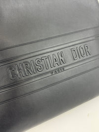 Smooth Calfskin Stripe Zip Clutch in Black