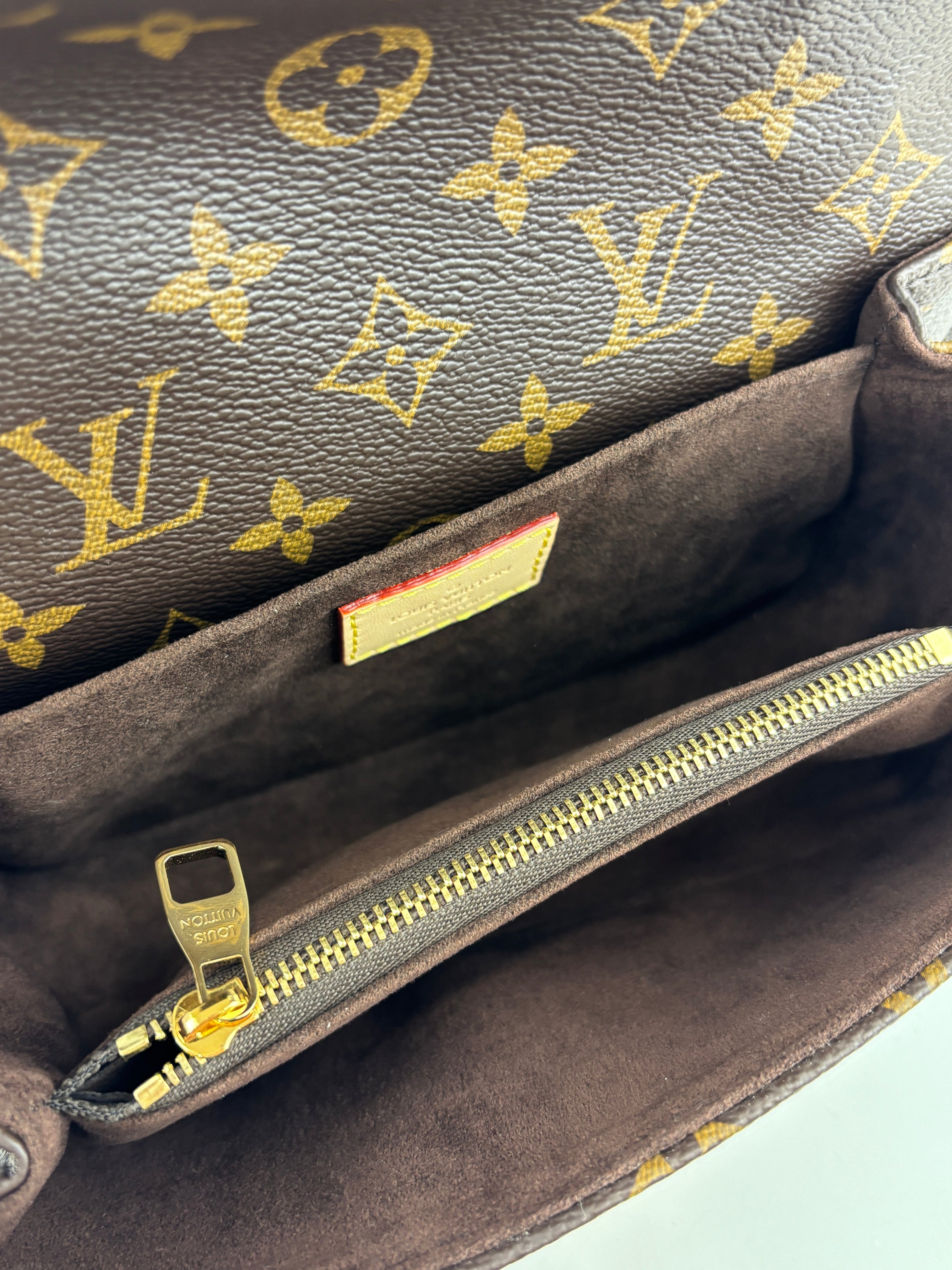 M46279 Pochette Métis East West Monogram Canvas