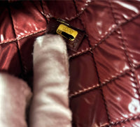 Mademoiselle Large O Case Clutch in Black Quilted Sheepskin
