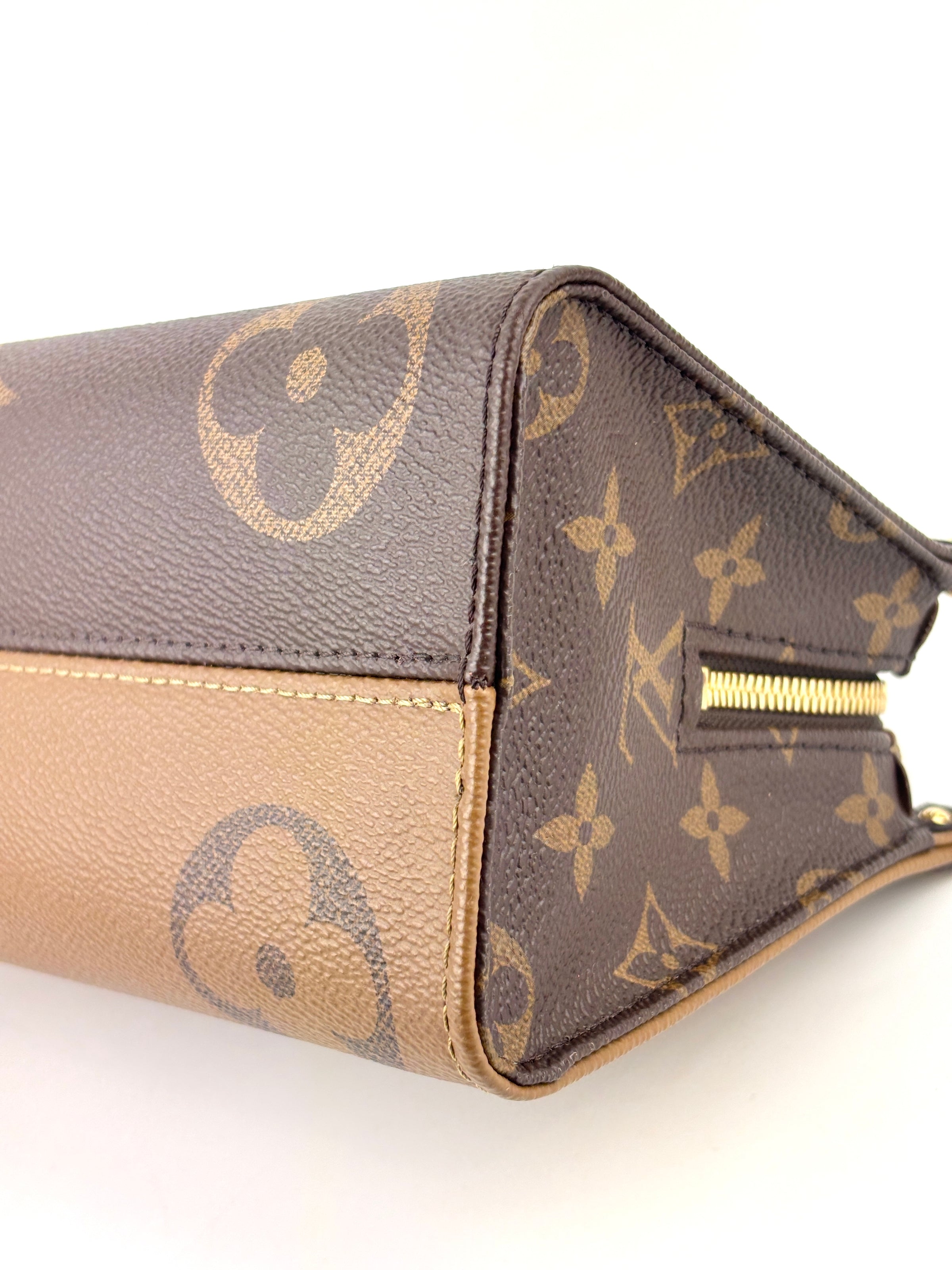 M46653 OnTheGo East West Monogram Reverse *RFID* - Glampot