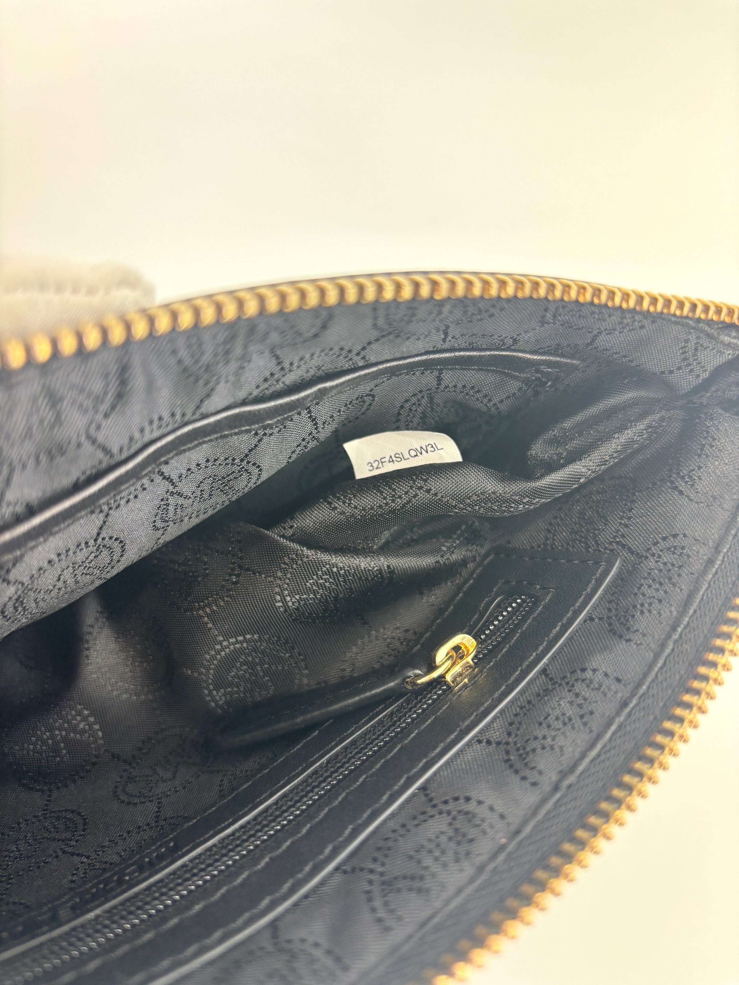 Selma Quilted Leather Zip Clutch