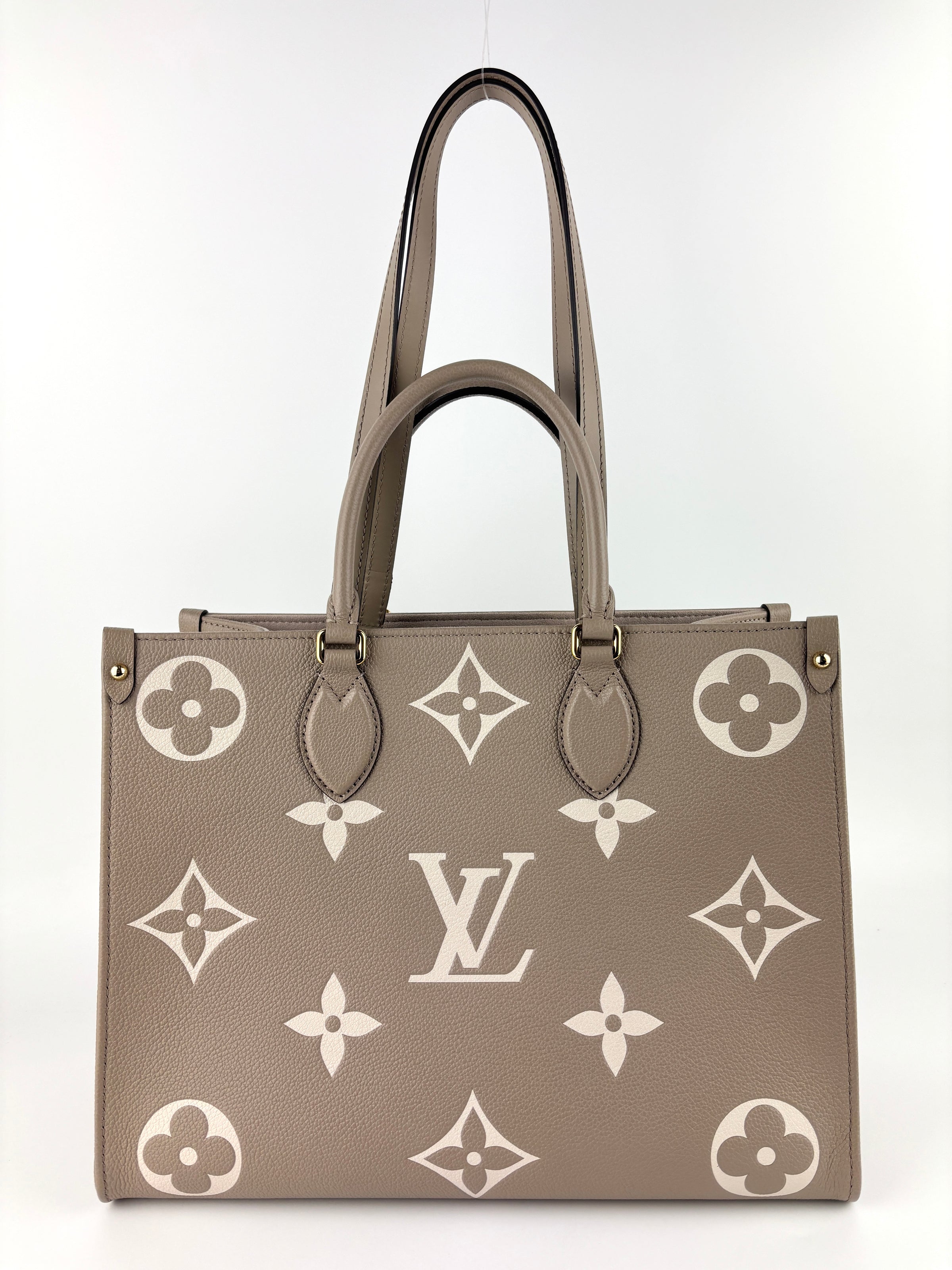 M45494 OnTheGo MM Bicolor Monogram Empreinte Leather Tourterelle / Crème - Glampot