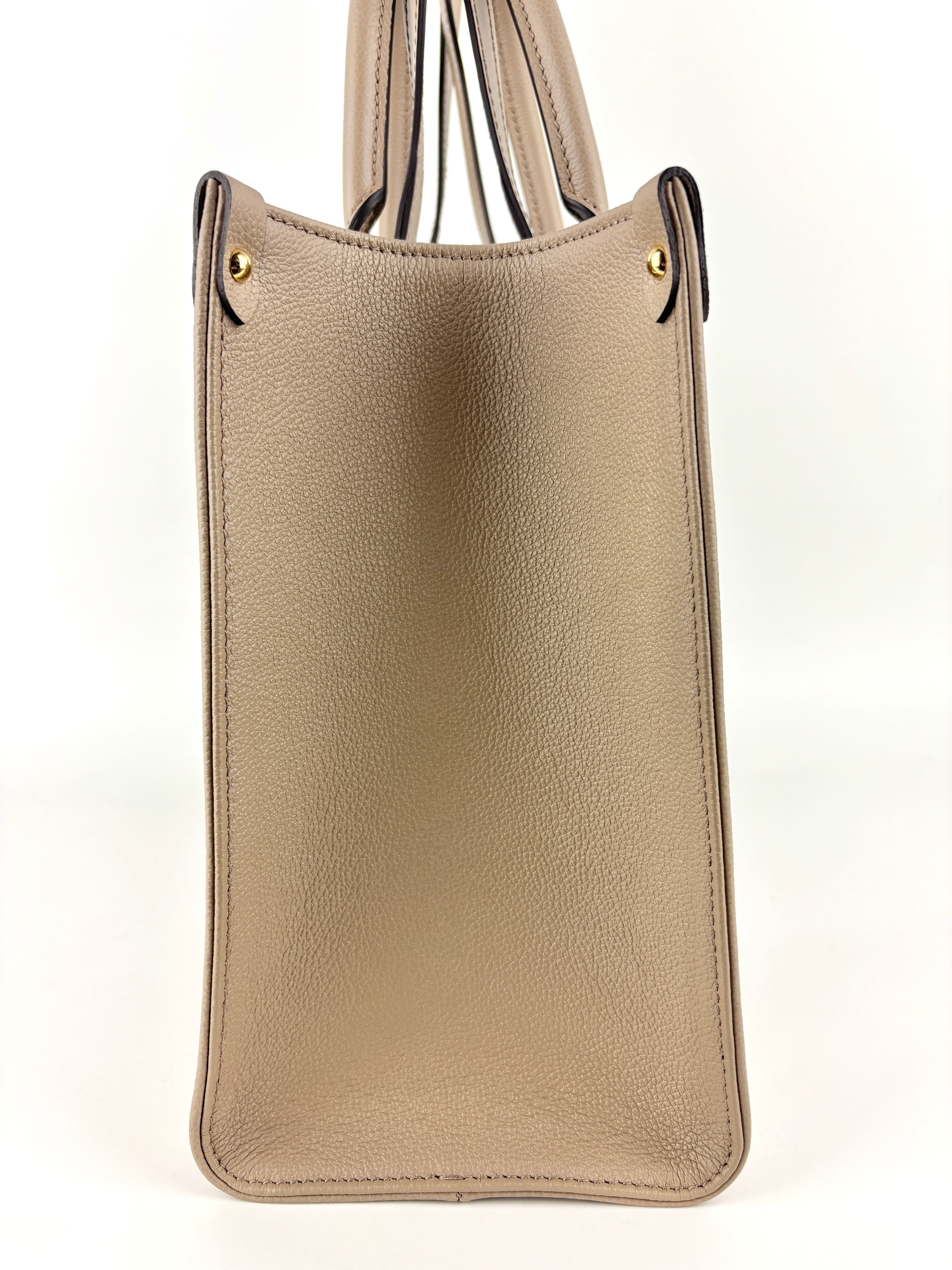 M45494 OnTheGo MM Bicolor Monogram Empreinte Leather Tourterelle / Crème - Glampot