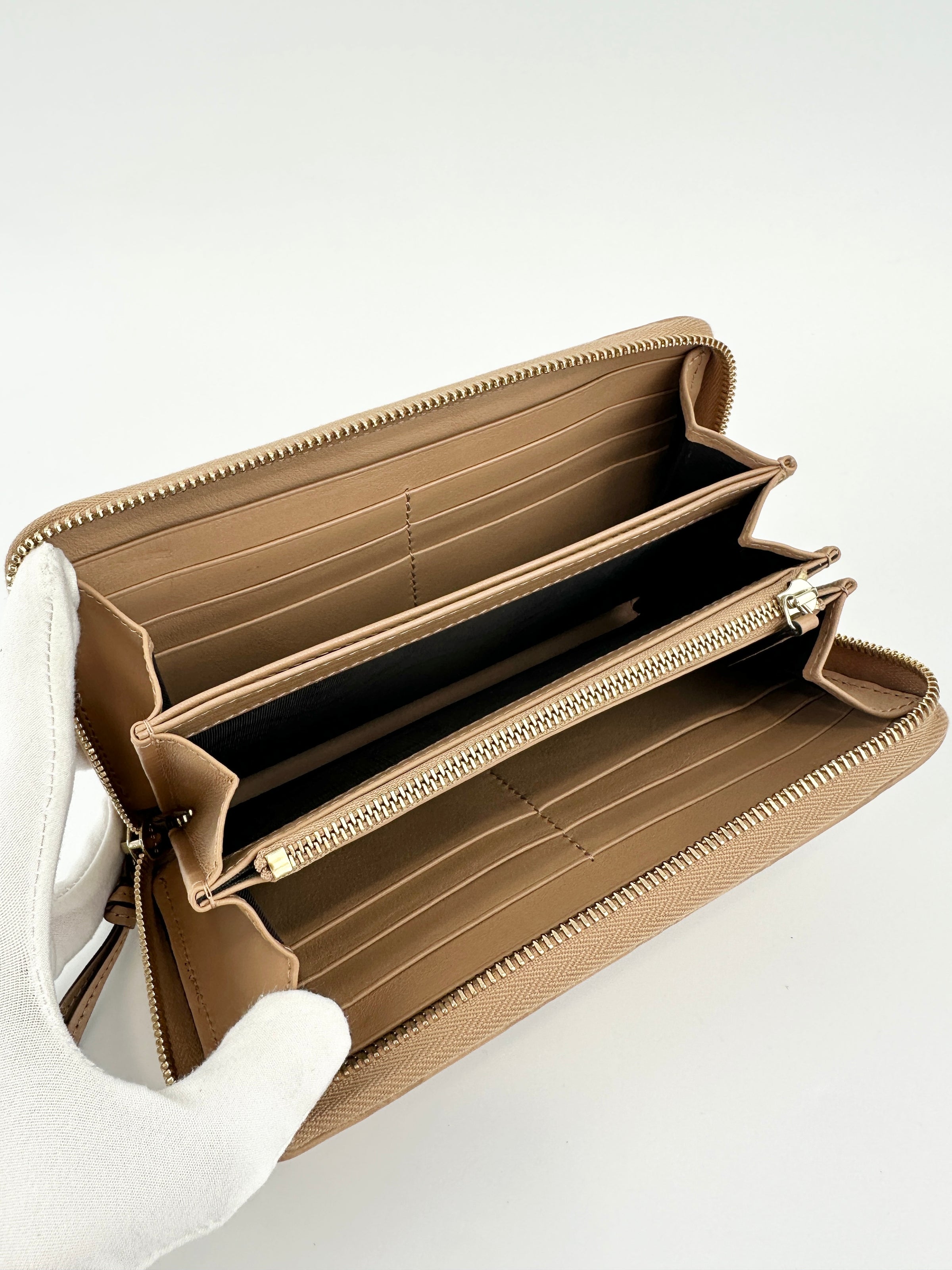 323397 GG Guccissima / Micro Guccissima Beige Leather Zip Around Long Wallet